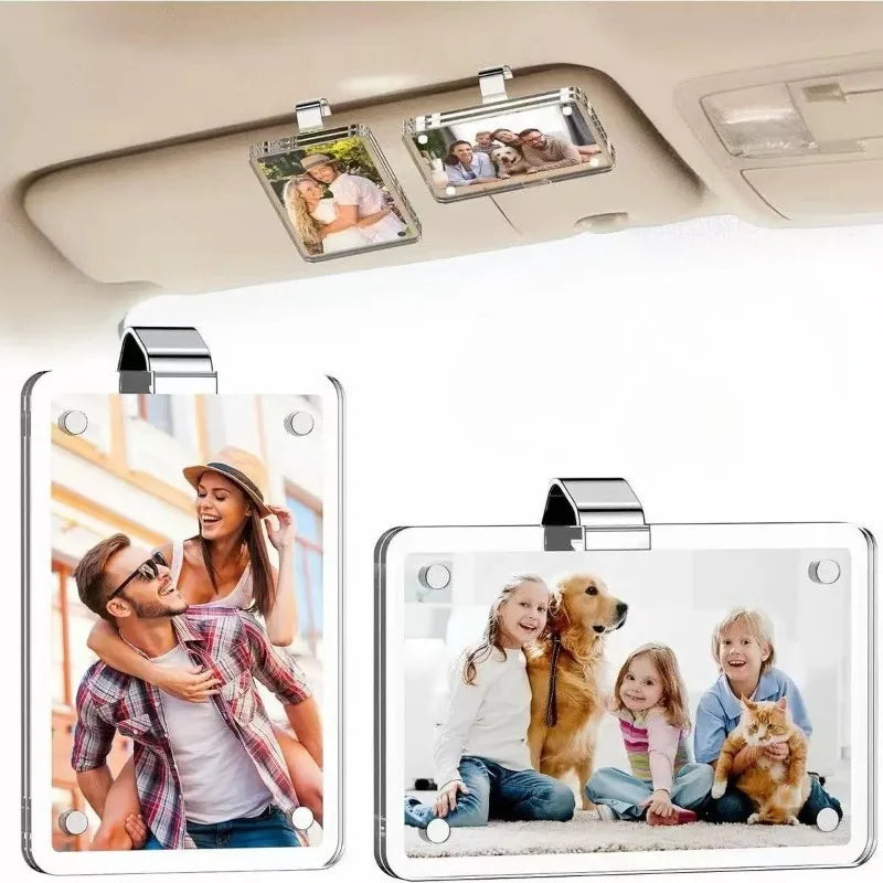 Magnetic acrylic photo holders mounted on a car sun visor displaying family pictures.