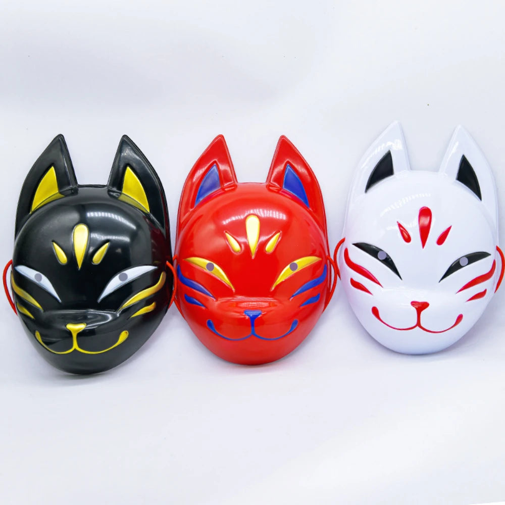 Three stylized fox face masks in black, red, and white are displayed against a white background.