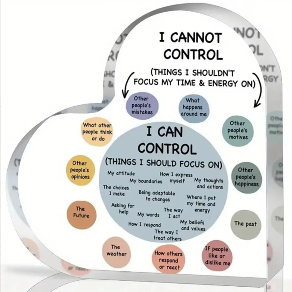 A heart-shaped acrylic sign illustrating the difference between things you cannot control and things you can control for ment