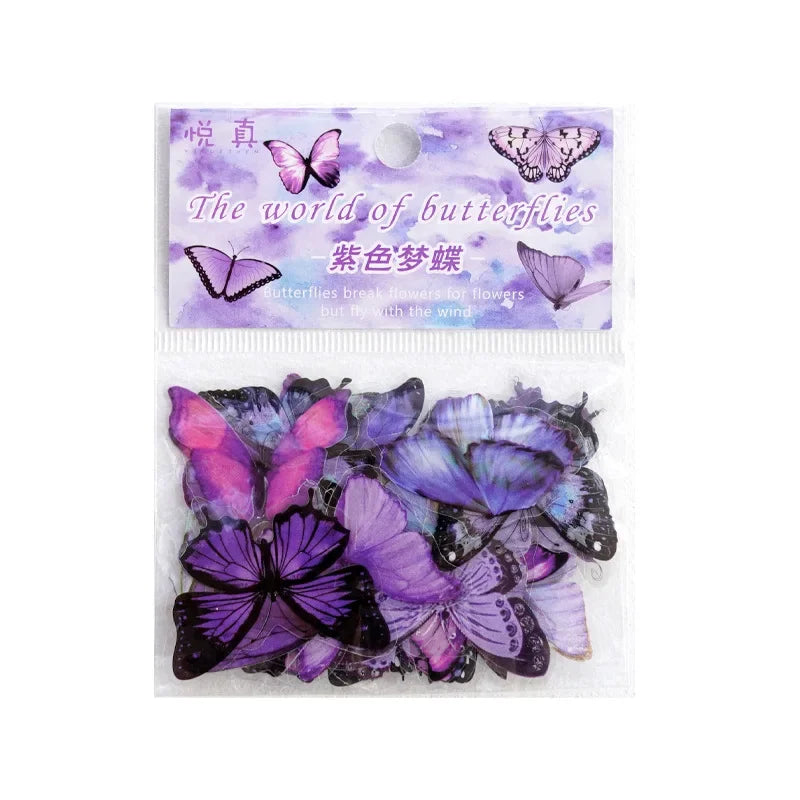 A clear plastic bag filled with colorful butterfly art collage stickers for scrapbooking