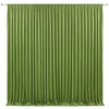 A floor-to-ceiling emerald green pleated drapery backdrop for events