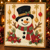 A detailed diamond painting of a white snowman with black hat and red scarf, set in a gold frame.