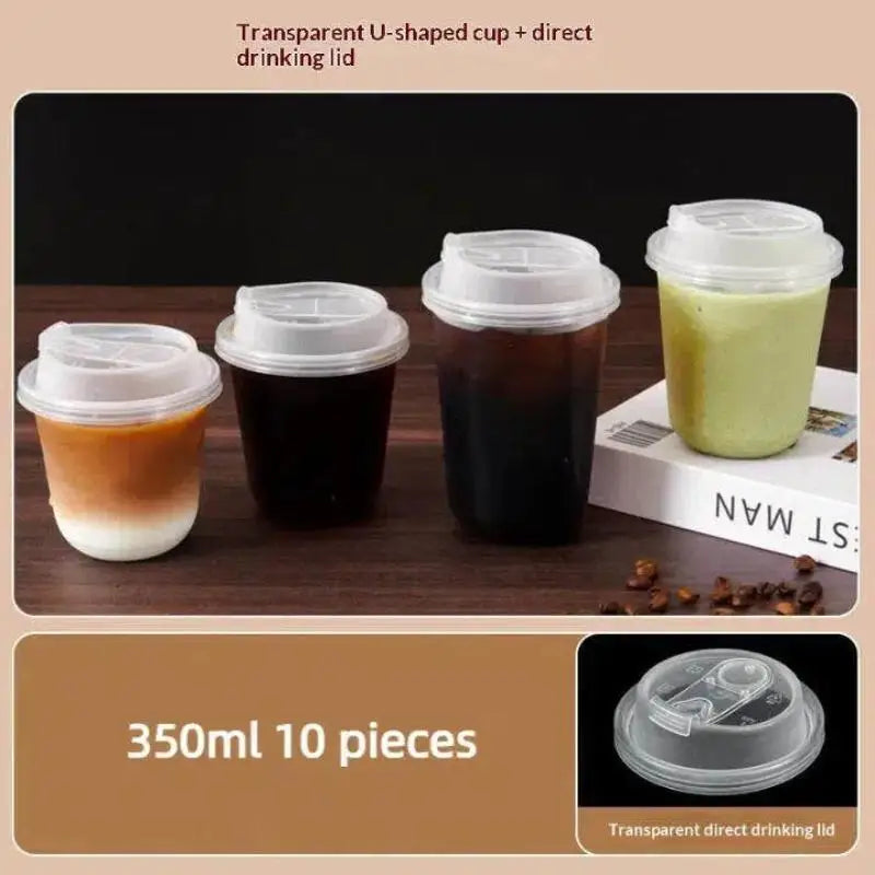 Tazas desechables transparentes en forma de U con tapas directas para bebidas calientes, mostradas sobre una superficie de ma