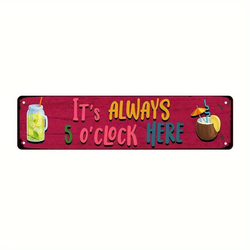 A vintage tiki bar metal sign with the text It's always 5 o'clock here and an illustration of a tropical drink.