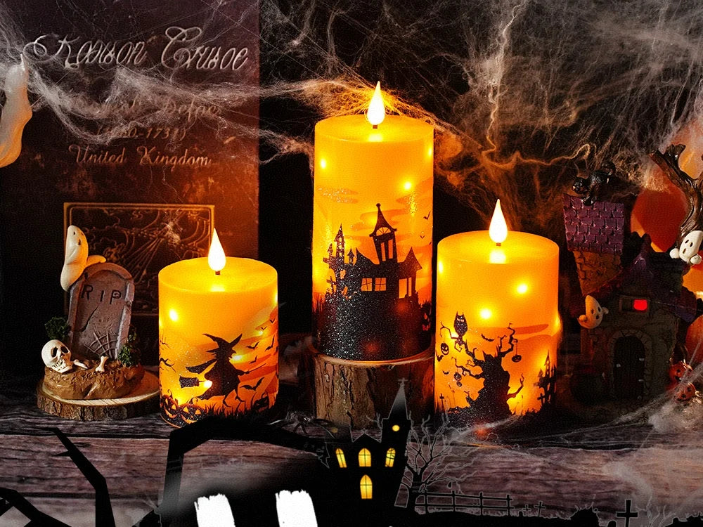 A collection of glowing pillar candles in various sizes and colors set against a dark, spooky Halloween backdrop.