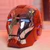An Iron Man MK5 wearable helmet in metallic orange with blue LED lights, shown from the front.