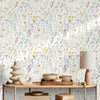 Boho floral peel and stick wallpaper featuring a dense pattern of multicolored wildflowers on a white background.