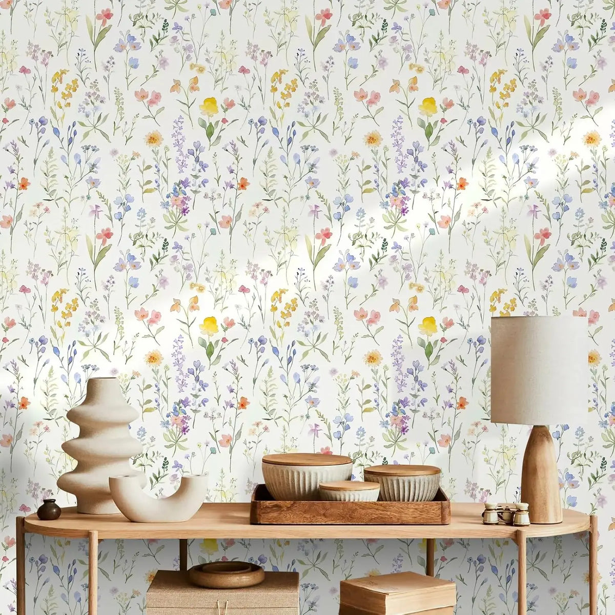 Boho floral peel and stick wallpaper featuring a dense pattern of multicolored wildflowers on a white background.
