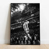 Black and white canvas wall art featuring a silhouette of Cristiano Ronaldo celebrating on a football field with stadium ligh