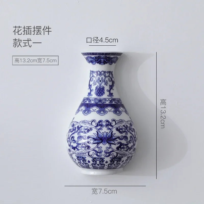 Antique blue and white ceramic wall vase with a round opening
