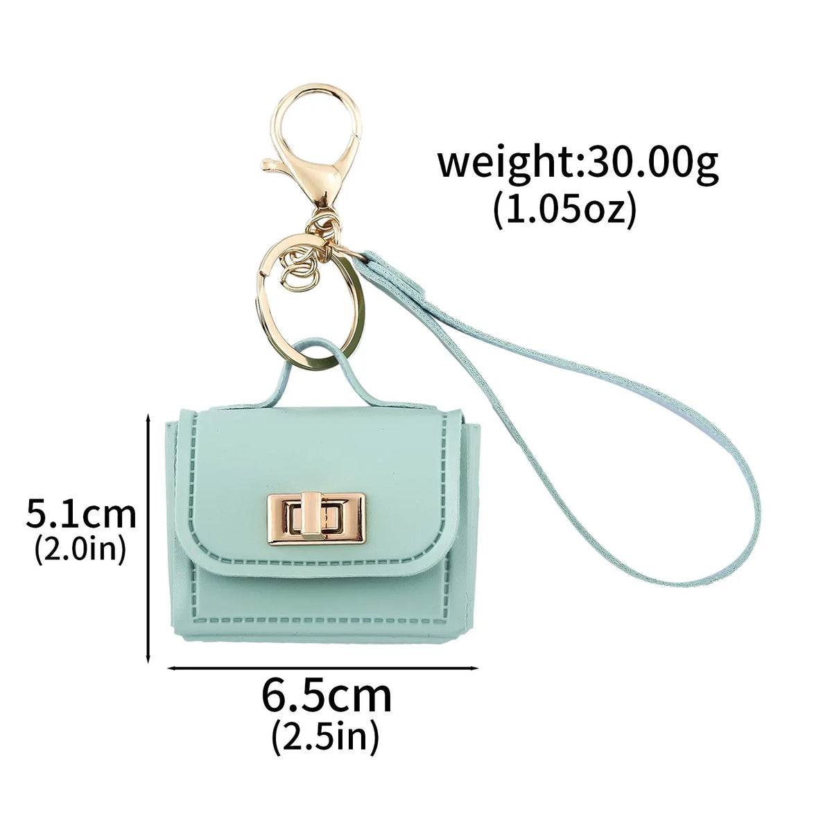 A light mint green mini leather openable bag keychain with a gold-tone clasp and a light blue cord.