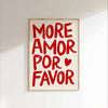 A framed canvas print with red text that reads MORE AMOR POR FAVOR on a white background.
