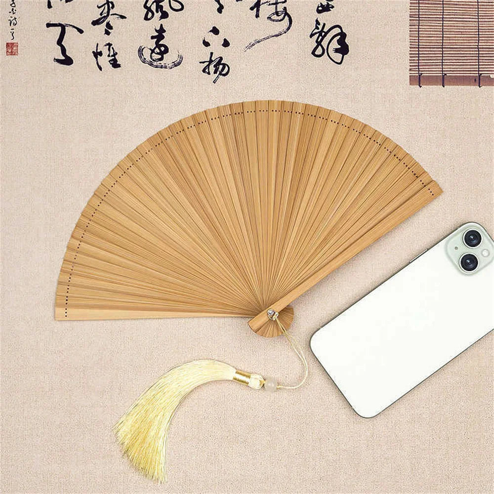 Traditional Bamboo Folding Fan with Solid Color Design