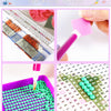 A diamond painting kit showing various colored beads and a grid pattern for creating a picture.