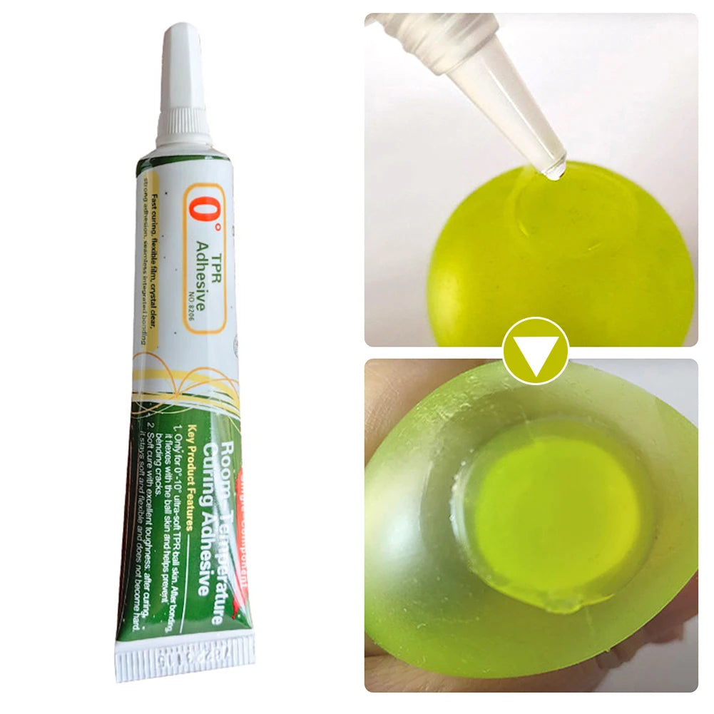 A bottle of clear adhesive for squishy toys repairs with a dropper, showing the liquid and a piece of green squishy toy.