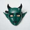 A dark green, horned fantasy creature mask with movable jaw and expressive eyes.