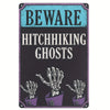 A dark metal tin sign with the text BEWARE HITCHHIKING GHOSTS and illustrations of ghostly hands in pots.