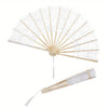 Elegant hollowout lace handheld fan with a light beige color and delicate patterns