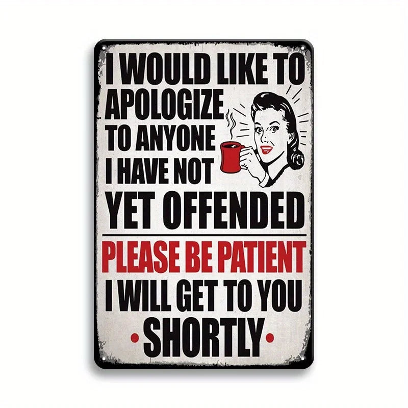 A distressed metal sign with black text on a white background apologizing and asking for patience.