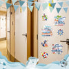 A set of seven birthday cruise door magnets featuring boats and tropical themes, displayed against a light wall.