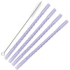 A set of clear reusable borosilicate glass straws with a cleaning brush.