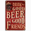 A vintage red metal sign with white text that reads Drink Good Beer with Good Friends