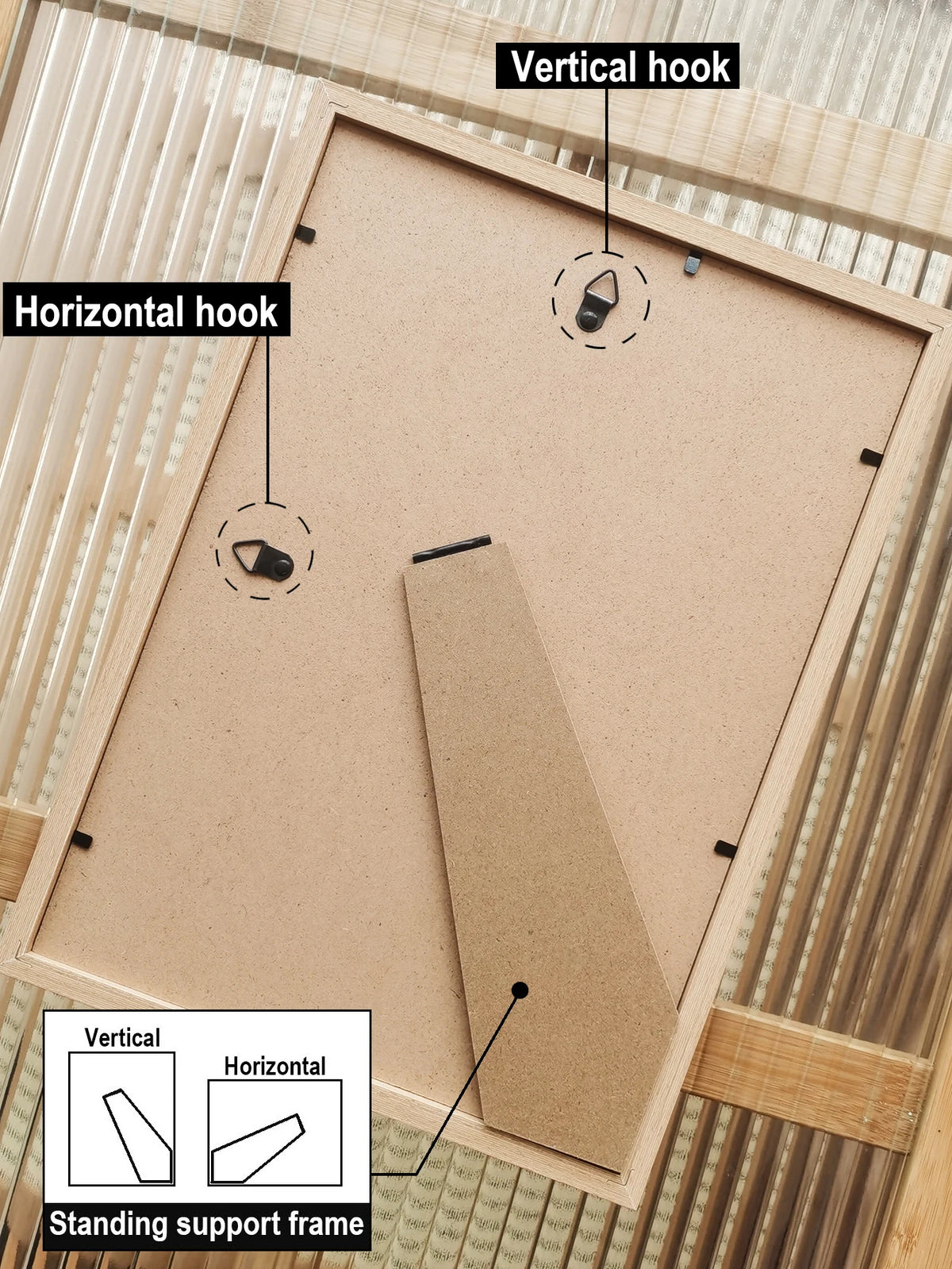 A wooden photo frame with hooks for vertical and horizontal display, shown alongside a standing support frame diagram.
