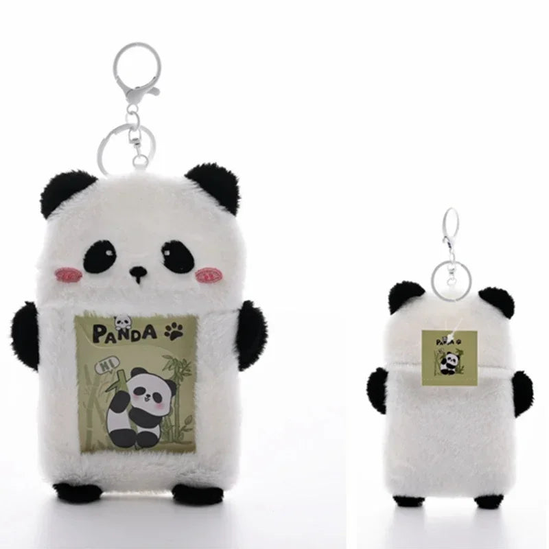White fluffy panda keychain with a face design and a green background