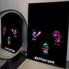 A dark poster featuring pixel art characters from Deltarune against a black background.