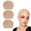 A realistic latex bald cap in a nude color shown separately and worn on a model's head.