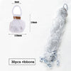 A bundle of 30 paper ribbons in red and brown colors for party decor.