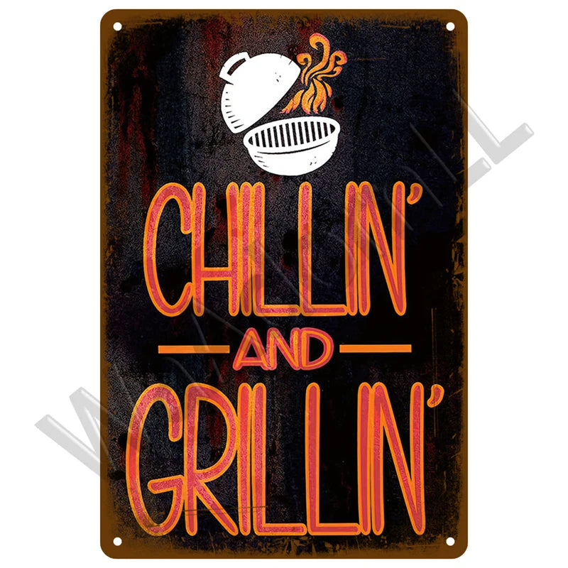 A dark metal sign with orange lettering that reads CHILLIN AND GRILLIN' and features an icon of a bowl with food.