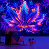 A vibrant neon cannabis leaf tapestry hangs on a wall, illuminating a purple and blue background.