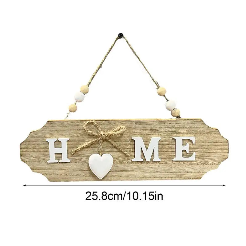 Double-sided wooden welcome sign with the word HOME carved into light wood and tied with twine