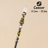 A natural clear quartz zodiac crystal wand with gold accents, displayed against a neutral background.