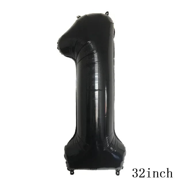 A black inflatable balloon shaped like a letter 'E' for music-themed party decorations.