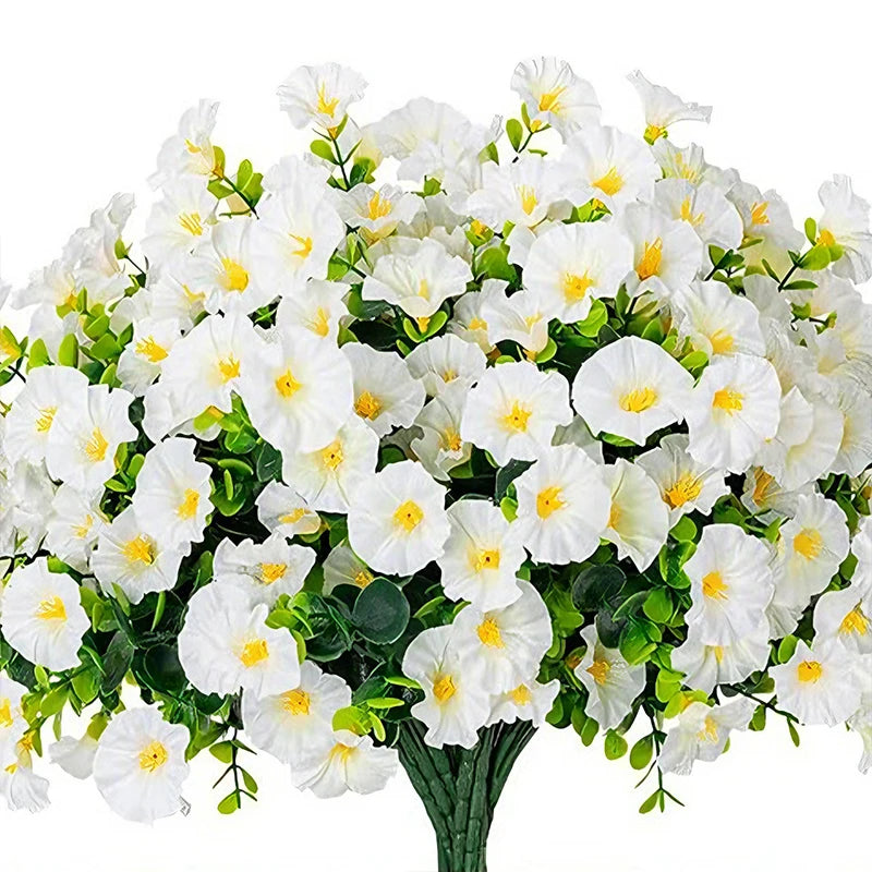 A bouquet of white artificial morning glory flowers and green eucalyptus stems.