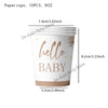 A white paper cup with gold lettering that reads Hello Baby.