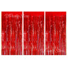Three vertical panels of shiny red metallic fringe curtains used for party backdrop decor