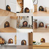 A collection of decorative mouse-shaped wall decals and figurines displayed on a wooden surface.