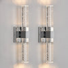 Modern bubble crystal LED wall sconces mounted on a light gray wall.