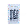 A pack of spiral birthday cake candles with star toppers in a white cardboard box.