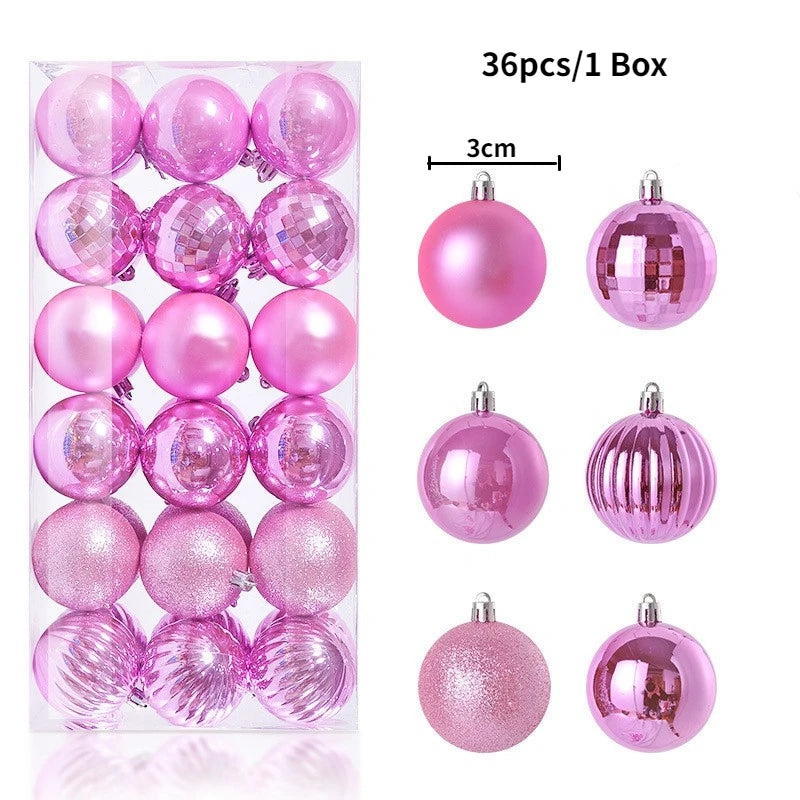 A box containing 36 pink and iridescent Christmas tree ornament balls.