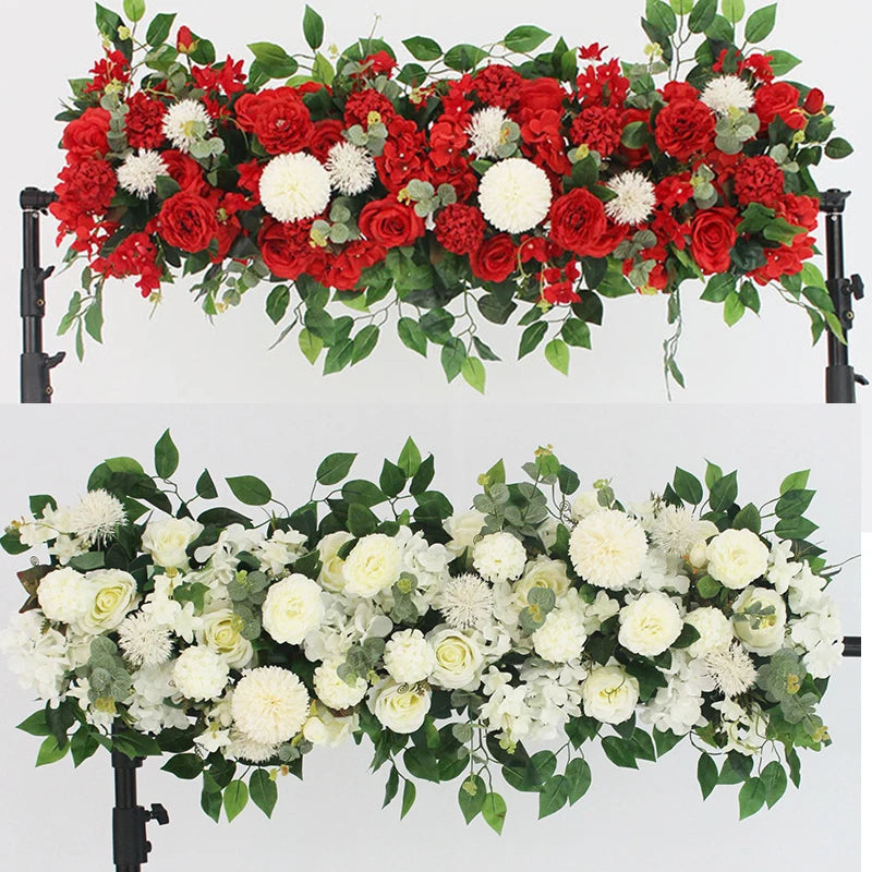 A lush floral arrangement of white roses and greenery for event decor.
