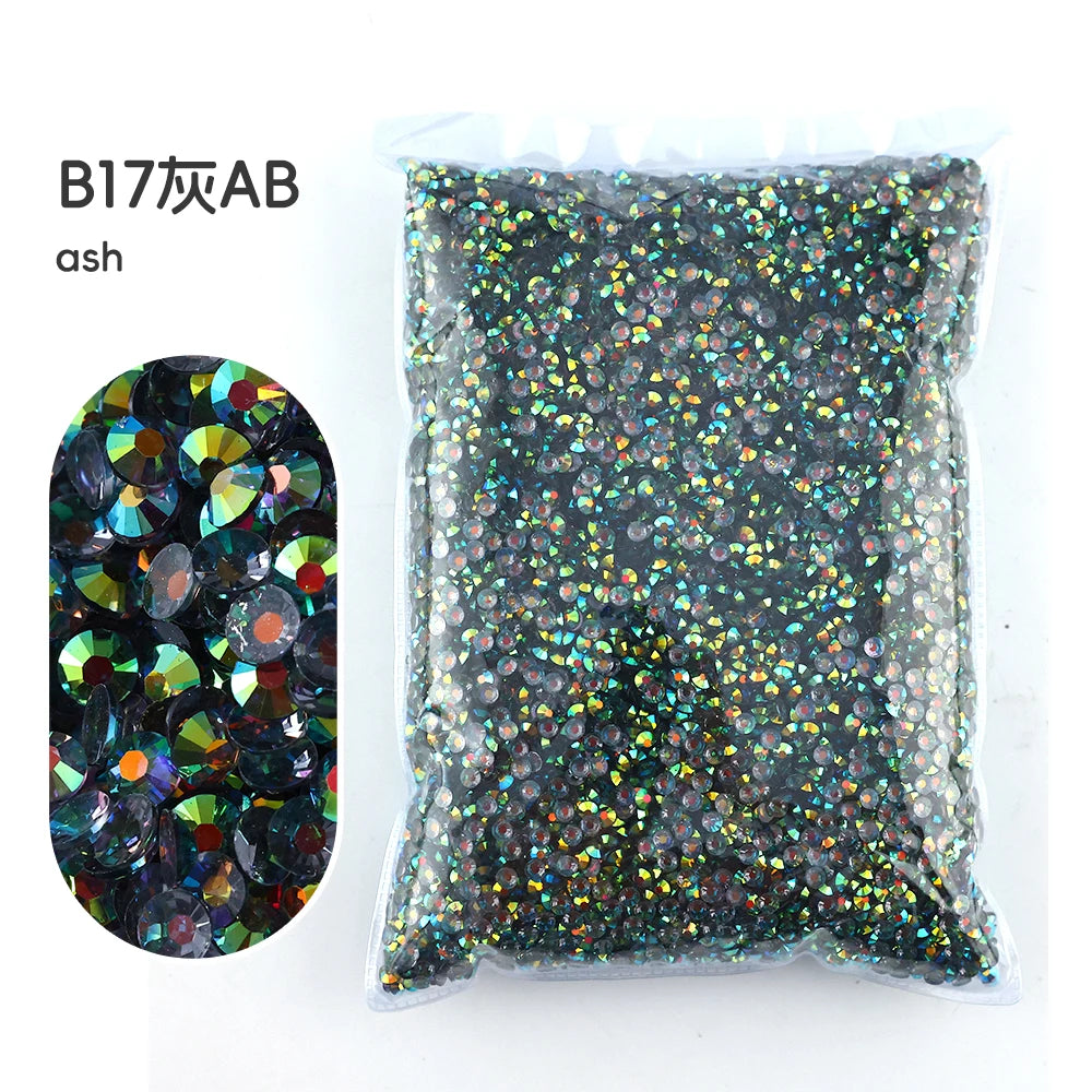 Bag of black and gold iridescent resin rhinestones for crafting