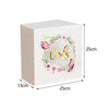 A rectangular white acrylic gift box with a floral and butterfly design, shown from the side.