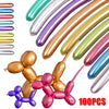 A set of 100 glossy latex modeling balloons in various colors and shades for party decoration