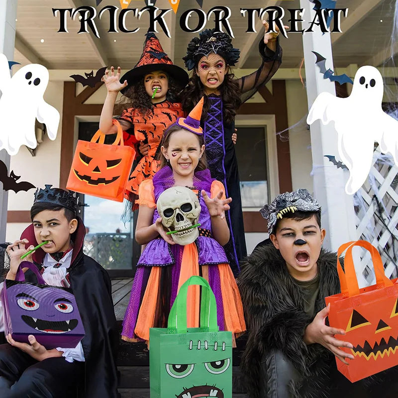 A group of people dressed in Halloween costumes holding orange and black treat bags with pumpkin and ghost designs.