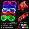A collection of five colored LED light-up glasses with an on/off switch and flashing modes shown next to three batteries.