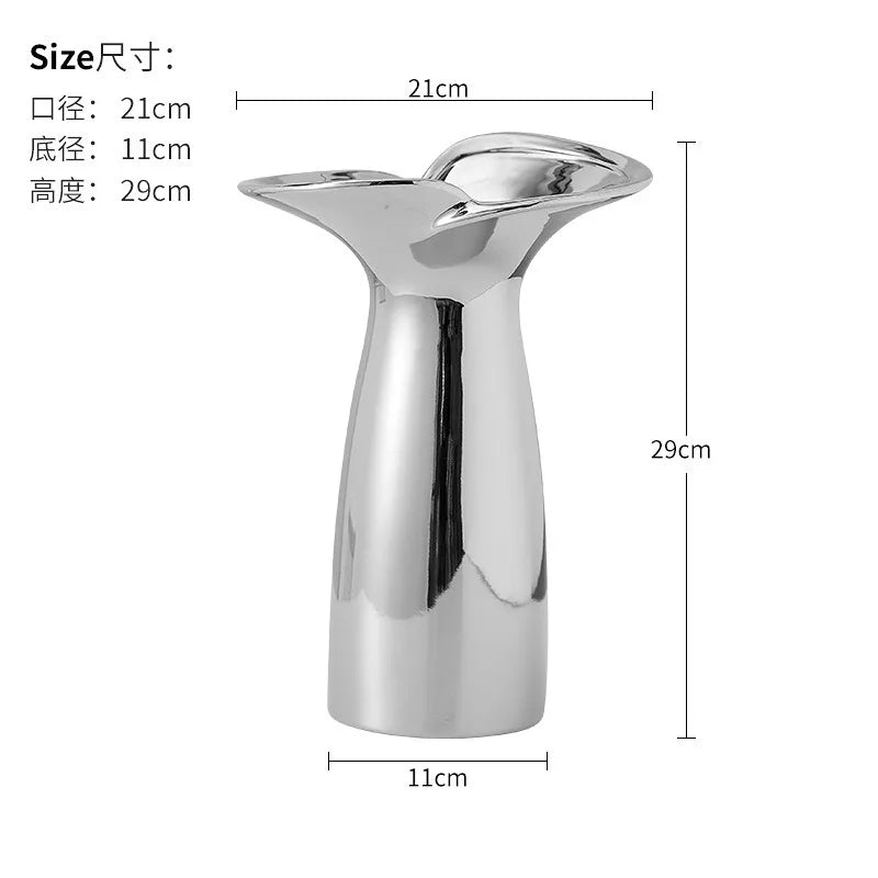 Silver-plated ceramic vase with a Nordic floral design featuring a flared opening and tapered body.